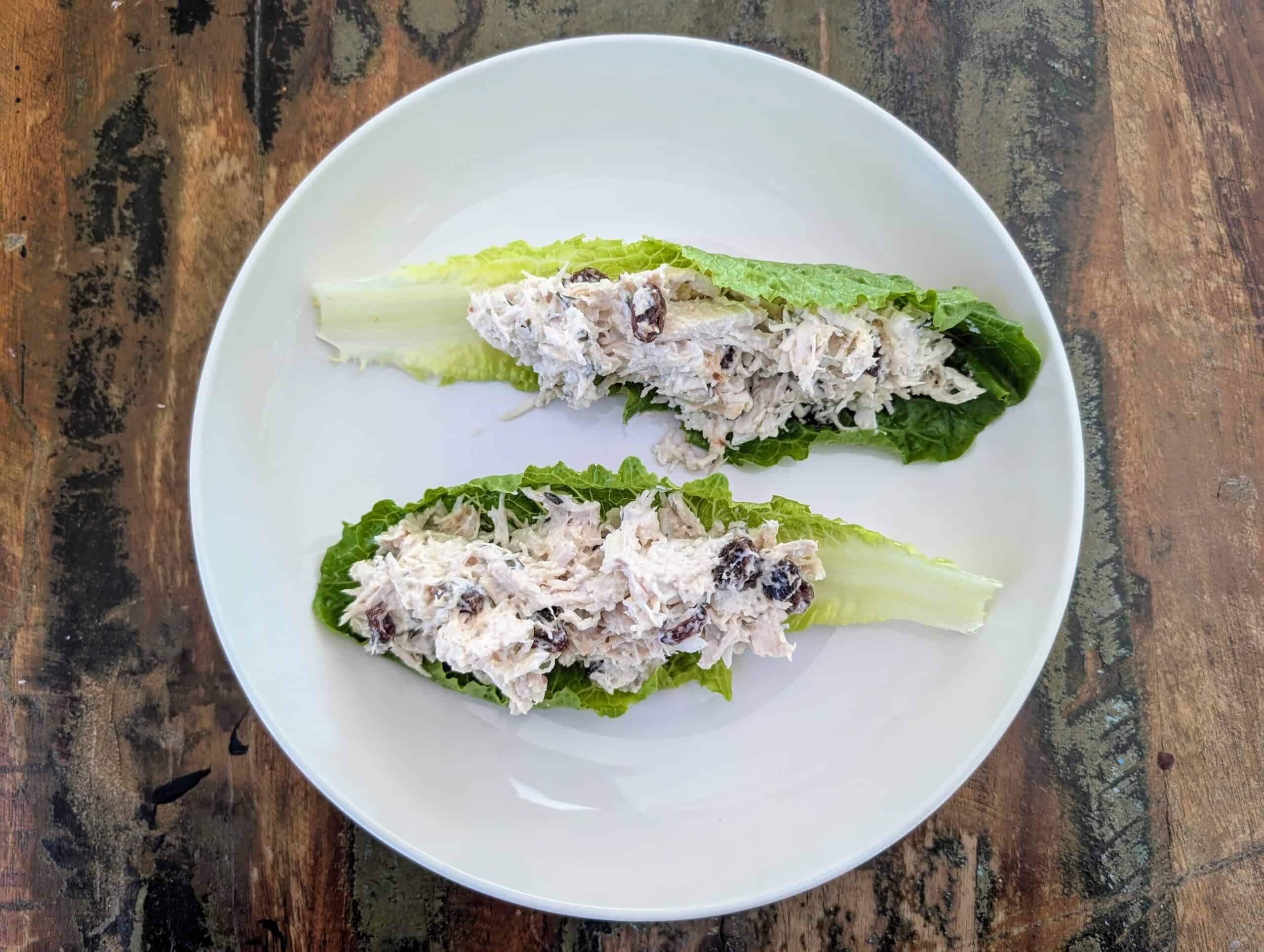 Simple Raisin chicken salad on romaine lettuce. 